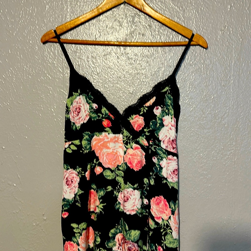 Rand new. Light weight summer dress with adjustable straps.